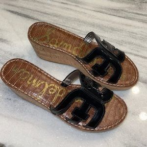 Sam Edelman black patten leather wedge sandals.